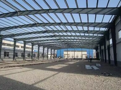 Geprefabriceerde stalen structuur magazijn industriële metalen frame gebouw grote overspanning opslagloods commerciële logistieke fabriek